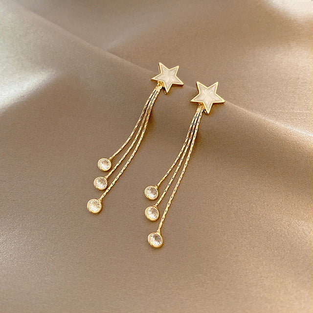 Aretes Colgantes de Estrella con Cristales en Oro