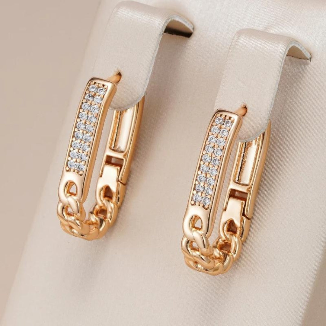 Aretes de Clip con Cadena Brillantes en Oro