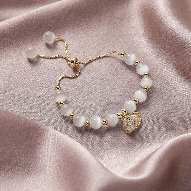 Pulsera de Concha con Piedras Naturales en Oro