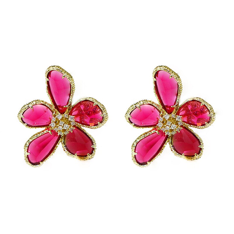 Aretes Rotativos Flor de la Riqueza con Circonitas Incrustadas