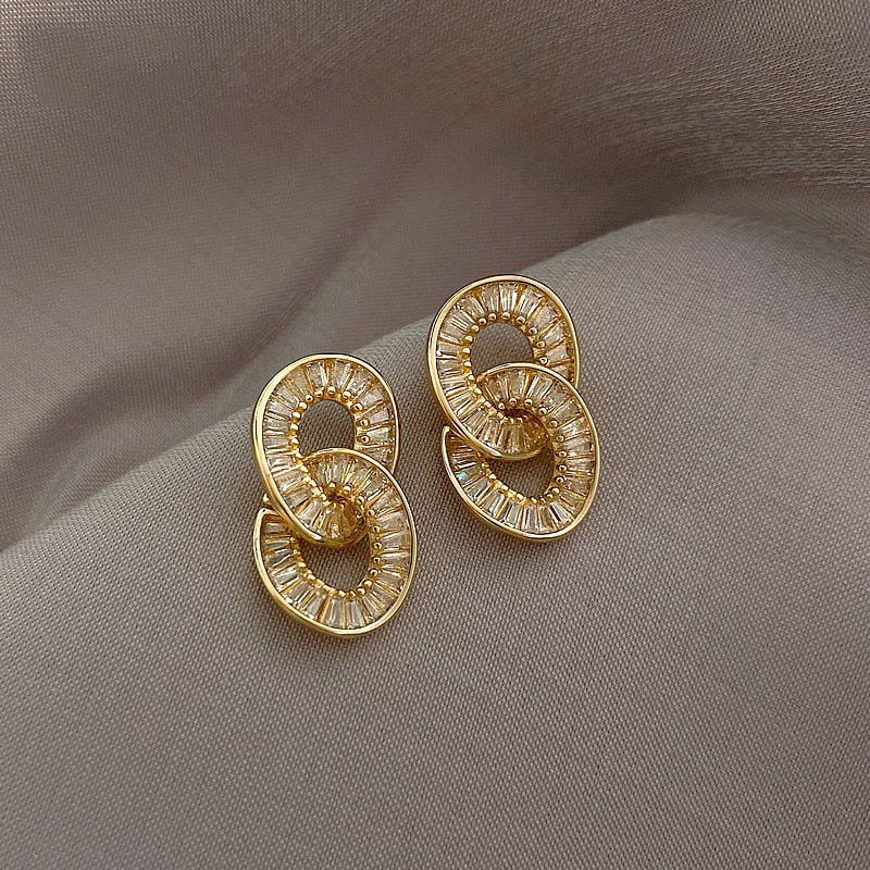 Pendientes con Circonita de Lujo en Oro