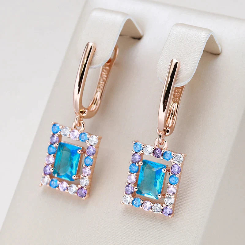 Aretes Cúbicos con Circonio Azul en Oro