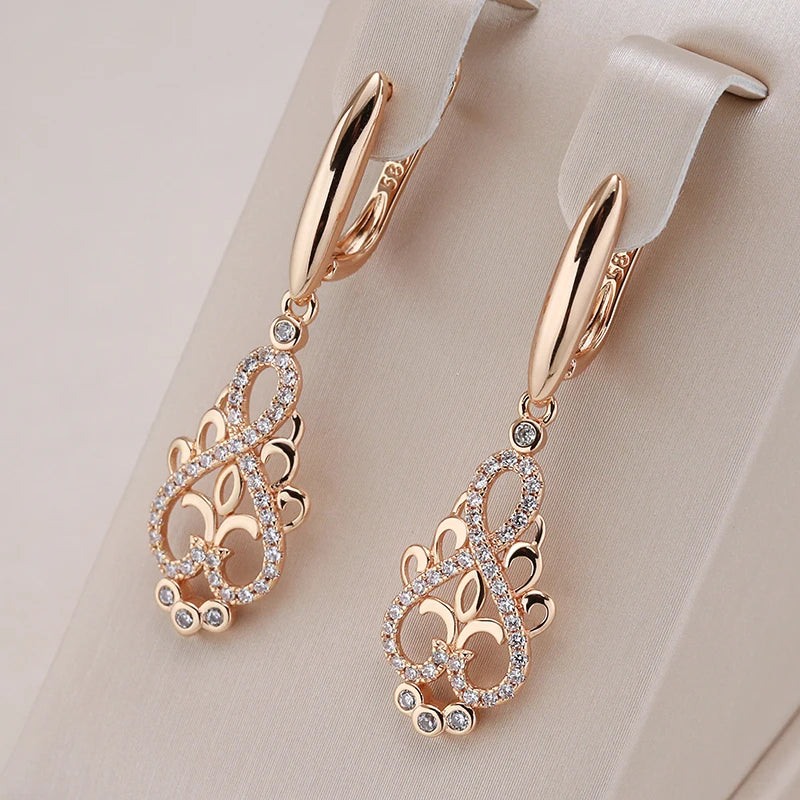 Aretes Elegantes Mandala con Circonitas en Oro